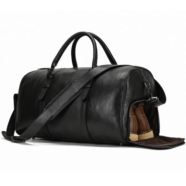 The black Pablo leather duffel bag angled view with shoes pocket open